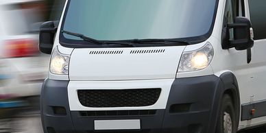 A close up of the front end of a van