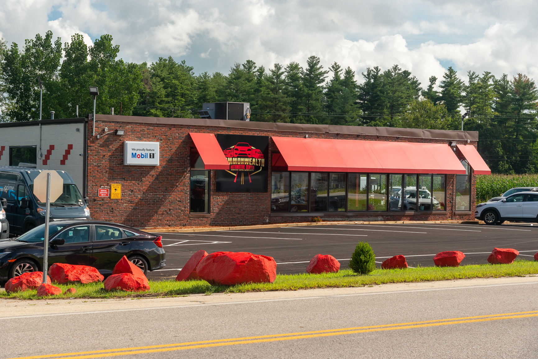 A car parked in front of a restaurant.